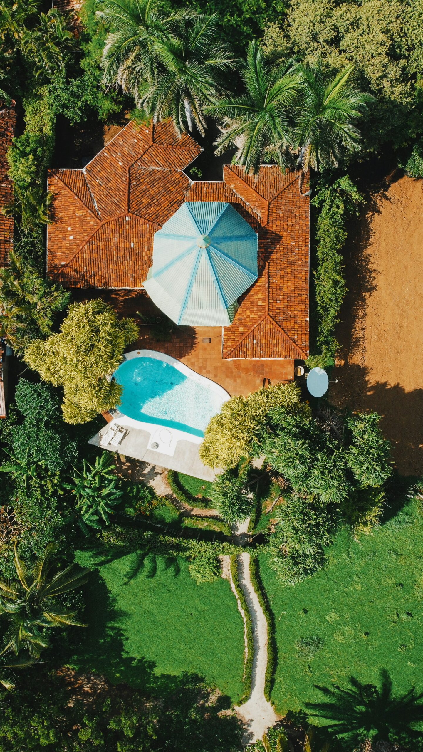 Aerial view of a luxury tropical villa where private chef dinners and special events are hosted.